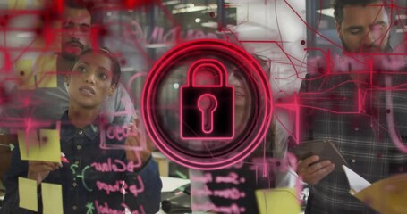 Business team sketching flowchart on glass wall, activating pulsing red padlock for data security - Powered by Adobe