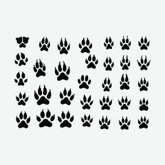 A clean vector collection of black animal paw print silhouettes featuring bears, cats, birds. Ideal for educational, graphic, or design use. Isolated on white background. © Mohammad Jaber