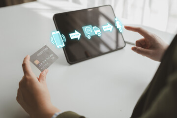 Online shopping and credit card payment concept, person is shopping on an online shopping website, purchasing goods and services securely, debiting credit card to pay for goods on the internet.