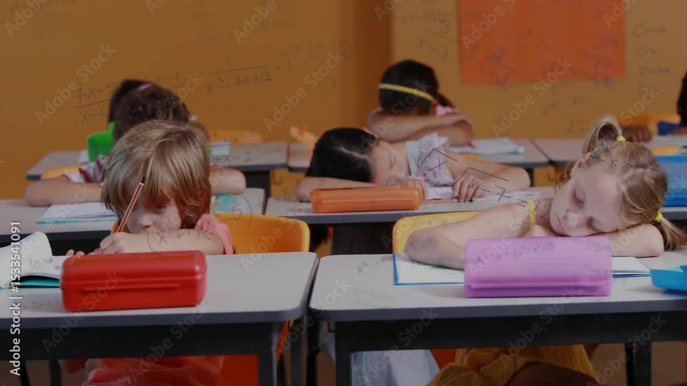 Poster boy writing in classroom pausing to view poster with chalk equations animating during math exercise