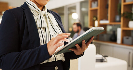 Hands, tablet and manager with woman in hotel for online booking, concierge and guest check in. Hospitality industry, information desk and digital administration for resort with person in lobby