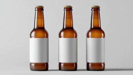 Three amber beer bottles with blank labels
