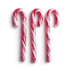 Three red-and-white striped candy canes arranged vertically against a plain white background