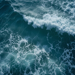 Seething sea water with waves and foam, top view. Water surface, textured background
