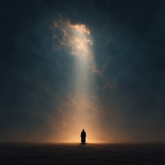 Obraz premium A solitary human silhouette stands bathed in a dramatic beam of heavenly light descending from a cloudy sky. 