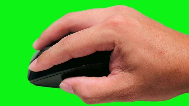 4K Video Human Hand and Computer Mouse on Green Background: A close-up image focuses on a hand comfortably gripping a computer mouse against a vibrant green backdrop.