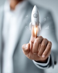 Naklejka na ściany i meble Businessman Launching Virtual Rocket with Financial Growth Icons and Upward Graph in Modern Office Digital Transformation and Market Disruption Concept