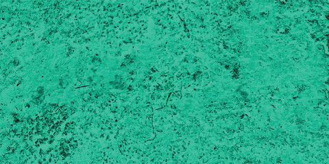 Abstract textured background in shades of green showcasing a rough weathered surface suitable for various design projects and digital artworks.