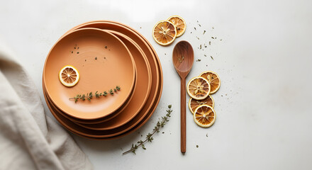 Brown ceramic plate with dried orange slices