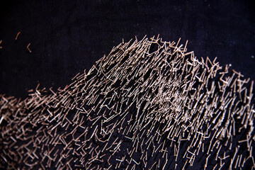 board composed of pins at the wall in the art museum