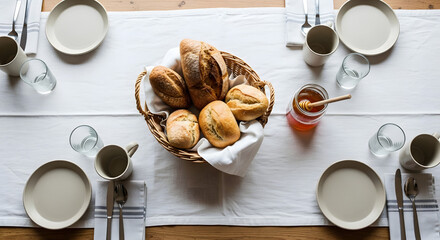 Breakfast table with croissants and tea