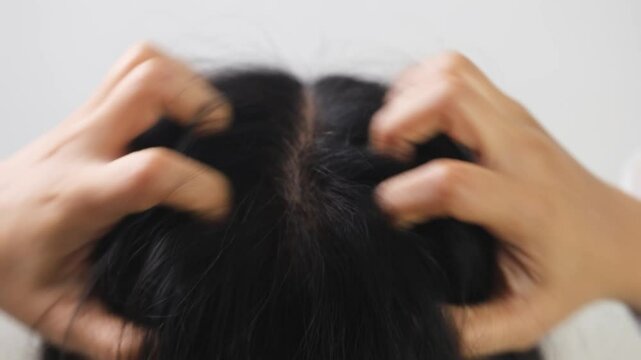 Woman has itchy scalp and hair loss