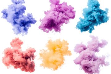 Fototapeta premium Colorful smoke bomb explosions create vibrant clouds in various shades during an outdoor celebration or event amidst clear skies
