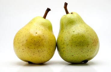 Two Deveci pears isolated on white background. Local variety known for strong aroma long storage. Popular fruit mostly consumed in winter. Fresh delicious antioxidant rich fruit.