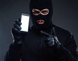 A man dressed in casual attire, wearing sleek black gloves, confidently holds up his smartphone, capturing a moment with a focused expression.