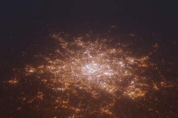 Aerial shot of Paris (France) at night, view from north. Imitation of satellite view on modern city with street lights and glow effect. 3d render