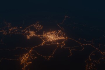 Aerial shot on Taif (Saudi Arabia) at night, view from west. Imitation of satellite view on modern city with street lights and glow effect. 3d render