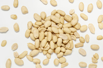 Peeled raw Peanut on white background