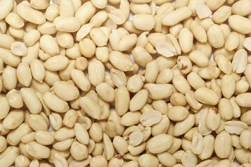 Peeled peanuts background