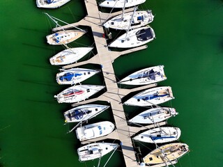 a marina with sailing ships – drone aerial photography