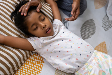 Child resting peacefully during relaxation session at home
