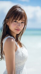 海の背景と美女のポートレート