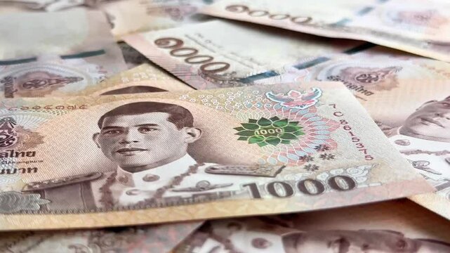 Close-Up of Rotated Thai Baht 1000 Banknotes – Business and Finance Concept