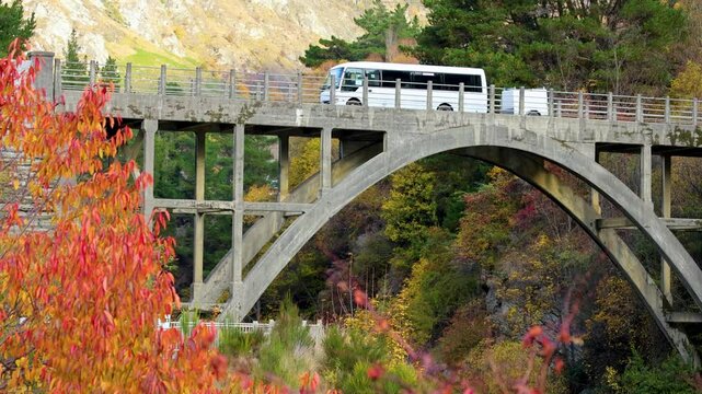Vehicles Crossing Edith Cavell Bridge in Autumn