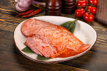 Raw marinated duck breast for cooking