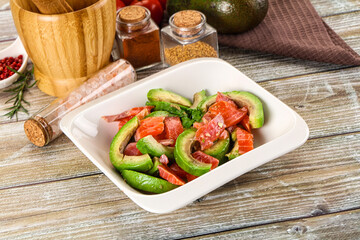 Salad with avocado and salmon