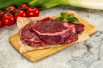 Raw beef cheeks cut for cooking