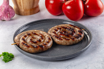 Grilled beef round circle sausages