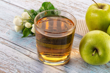 Apple yellow juice in the glass