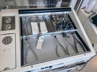Surgical instruments neatly arranged in a medical workspace ready for upcoming procedures