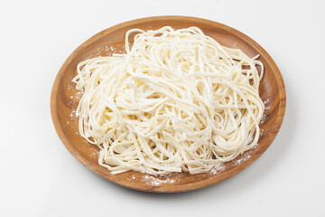 A food product made by kneading flour, buckwheat flour, potato flour, etc. and then stretching the dough into thin, long pieces by hand or machine.
