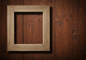 Square wooden frame hanging on a rustic wooden wall with visible wood grain and natural imperfections