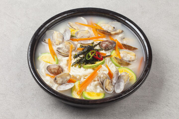   A dish made by kneading wheat flour, rolling it out thinly with a mallet, then cutting it into...