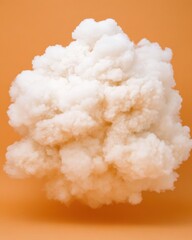 White Fluffy Cloud Against Orange Background