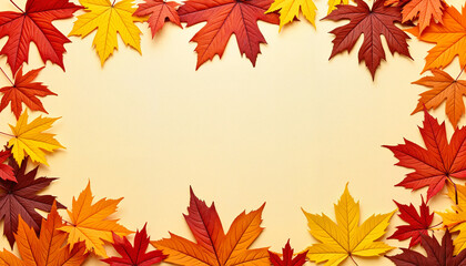 Colorful autumn leaves arranged in a frame on a beige background  