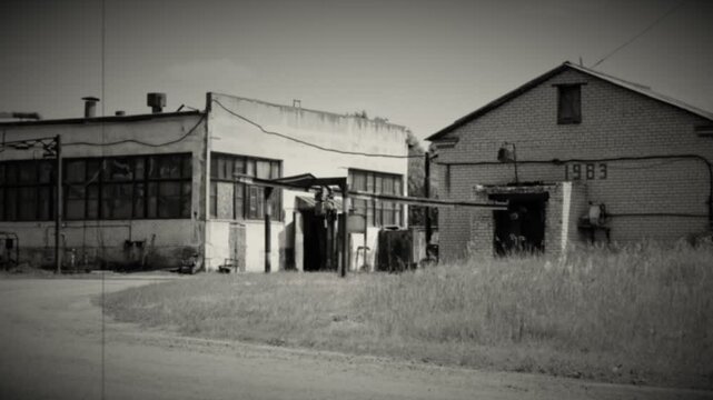 Aged shots of abandoned and destroyed production halls. An abandoned Soviet-era factory.