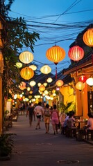 Fototapeta premium Enchanting Night Scene in Hoi An Ancient Town: Illuminated Street with Lanterns and People