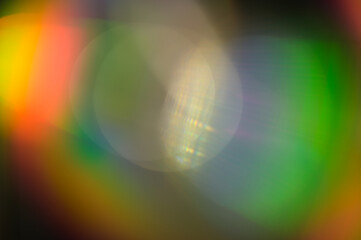 Rainbow light bokeh with iridescent gradient reflections photo filter vintage effect	