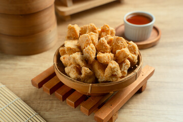 Indonesian Snack Food. Bakso Goreng or Deep Fried Meatball. Made from Chicken, Meat, or Shrimp with Flour. Served with Spicy Sauce. Perfect for recipes, articles or any cooking content.