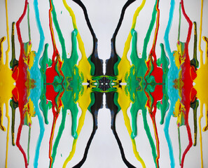 Colorful paint dripping. Blue, green, red, yellow. Abstract background with acrylic or oil paints on canvas. 