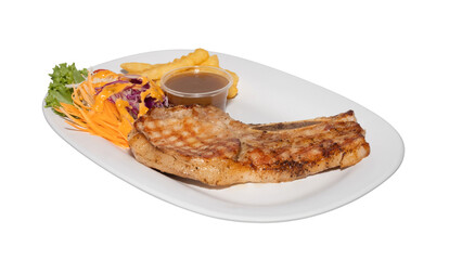 Grilled Pork Chop with Salad, Fries, and Gravy Sauce on White Plate