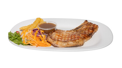 Grilled Pork Chop with Salad, Fries, and Gravy Sauce on White Plate