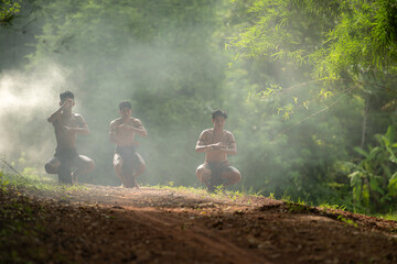 A farmer and a rice worship ritual with a group of traditional dancers
