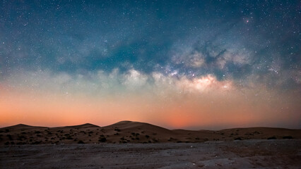 Milky Way core almost parallel to the sand dunes in the Al Qua'a Desert in Abu Dhabi, United Arab Emirates