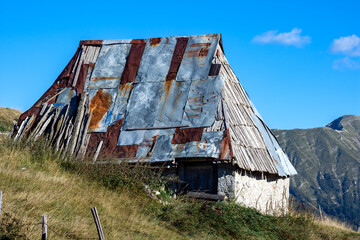 Haunting Beauty of an Abandoned Farmhouse with Corroded Roof