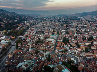 Spectacular Sunrise Aerial Panorama of Sarajevo's Old Town and Encircled Hills